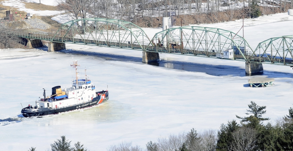 The 140-foot Coast Guard cutter Thunder Bay stops to turn around in this March 27, 2014, file photo near the old Richmond-Dresden Bridge on the Kennebec River.
