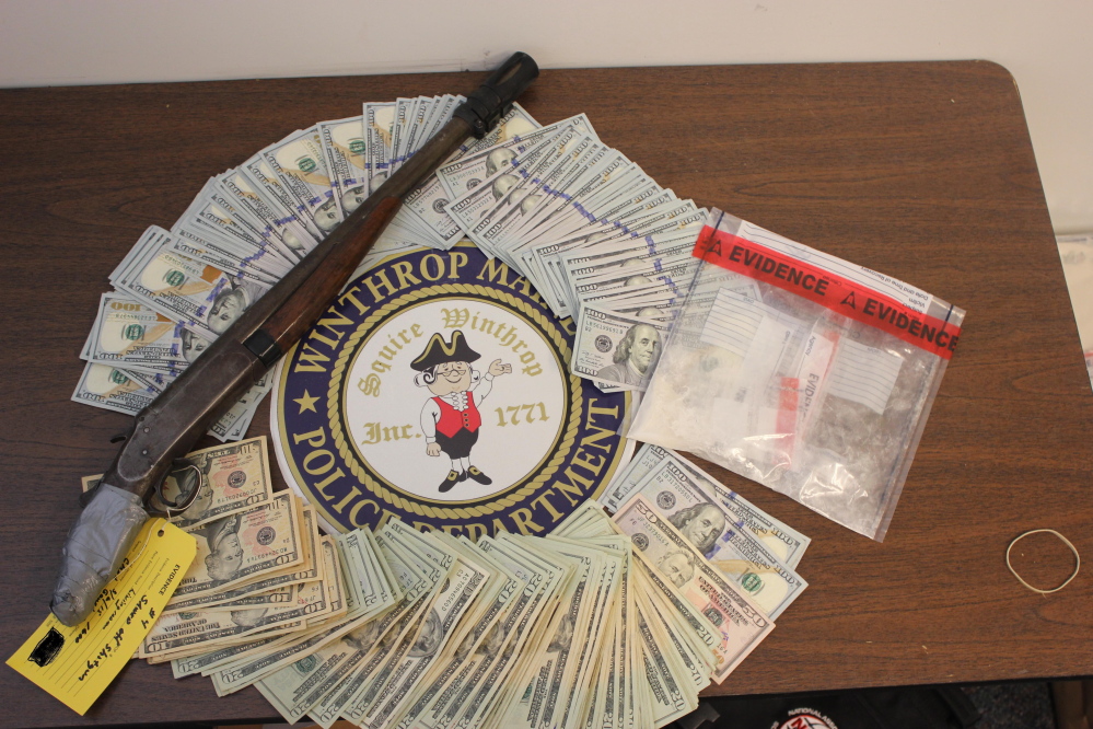 Police found a sawed-off shotgun, heroin and more than $15,000 in cash after executing a search warrant Friday on Mount Pisgah Road in Winthrop.