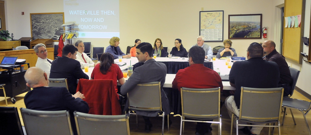 Members of the Waterville City Council and the city’s Board of Education gather on Tuesday in the council chambers for their joint meeting to discuss the education budget.