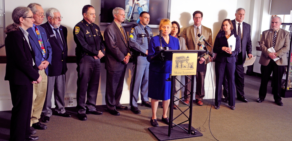 Attorney General Janet Mills talks about the Financial Crimes Against the Elderly report during a news conference on Wednesday at the State House in Augusta.