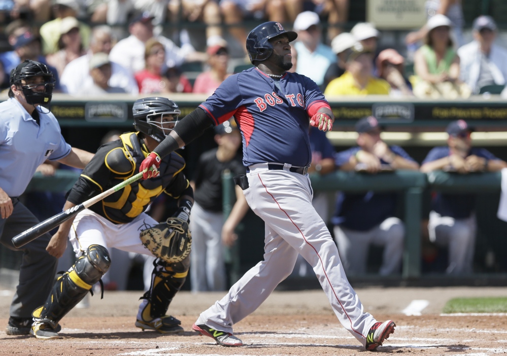 Boston Red Sox designated hitter David Ortiz watches his three-run home run clear the center field wall Thursday during the third inning against the Pittsburgh Pirates in Bradenton, Fla.. The Red Sox defeated the Pirates 5-1.