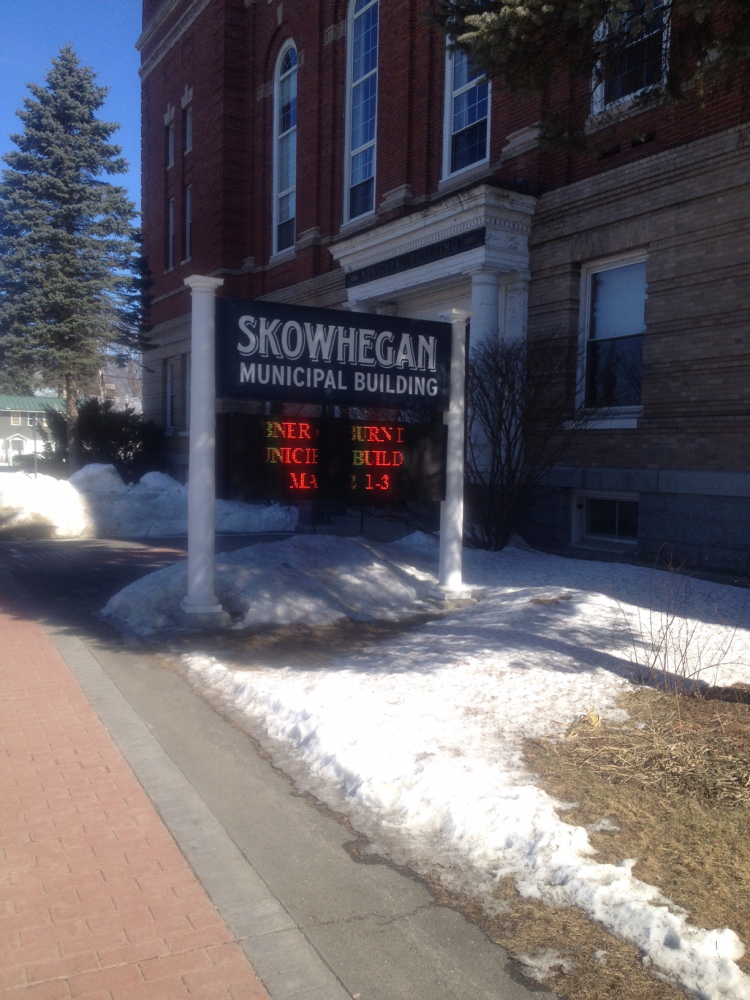 Two packets found Thursday at the Skowhegan Municipal Building, prompting evacuation of the building, were determined to be harmless military training devicies, the police chief said Friday.