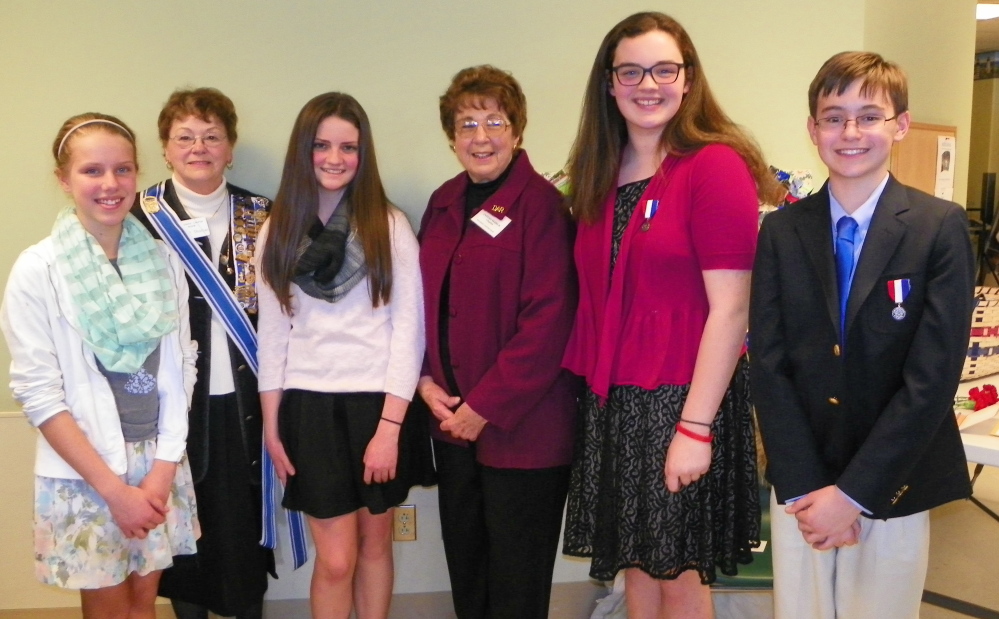 Students from St. Michael School in Augusta participated in the Daughter of the American Revolution Chapter of Augusta essay contest. They are, from left, Madeline Levesque, Ann Thomas, co chairwoman, Jillian Coull, Cynthia Herrick, co chairwoman, Gabrielle Low, Hagen Wallace. All these students are from