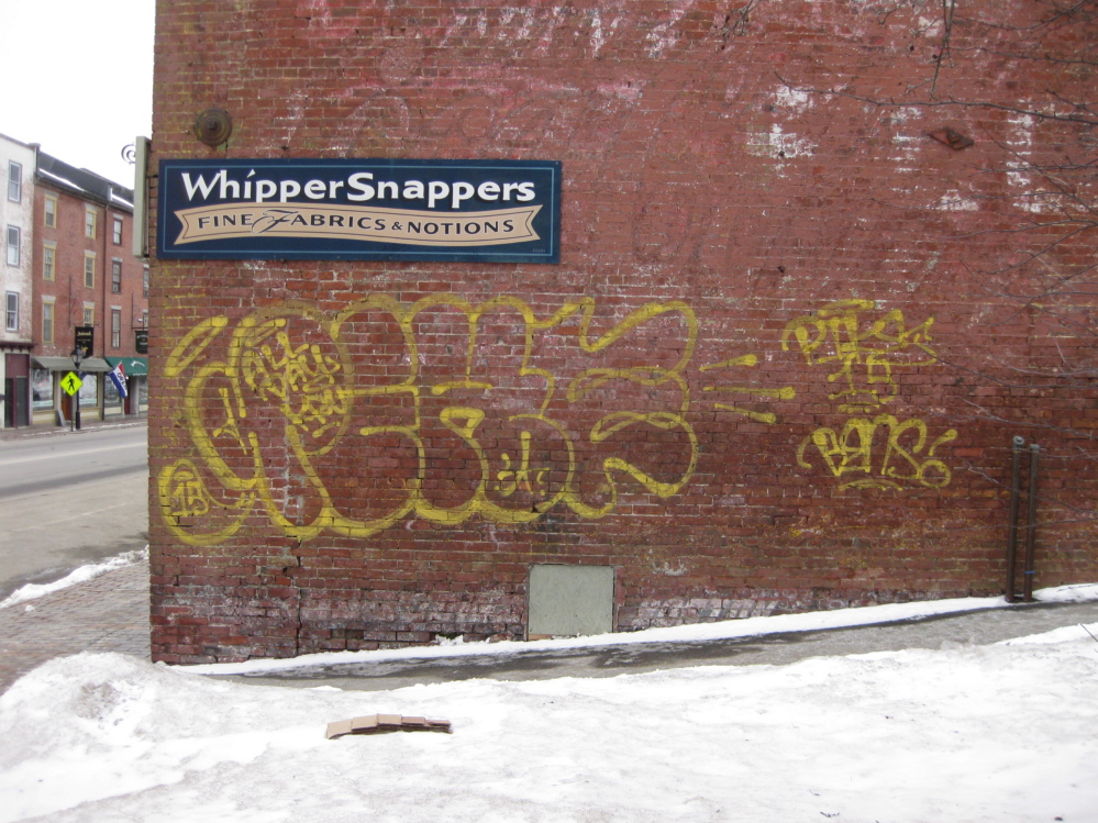 The side of the building at 107 Water St. was tagged with graffiti Monday night.