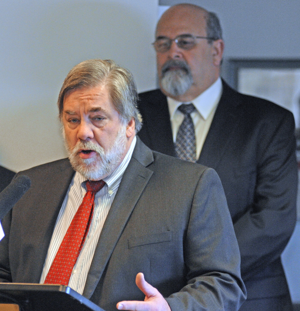 Gardiner Mayor Thom Harnett speaks during a news conference by the Mayors’ Coalition on Jobs and Economic Development, where they released a plan, “Cities of the Future,” on Wednesday in the State House in Augusta. Augusta Mayor David Rollins is in the background.