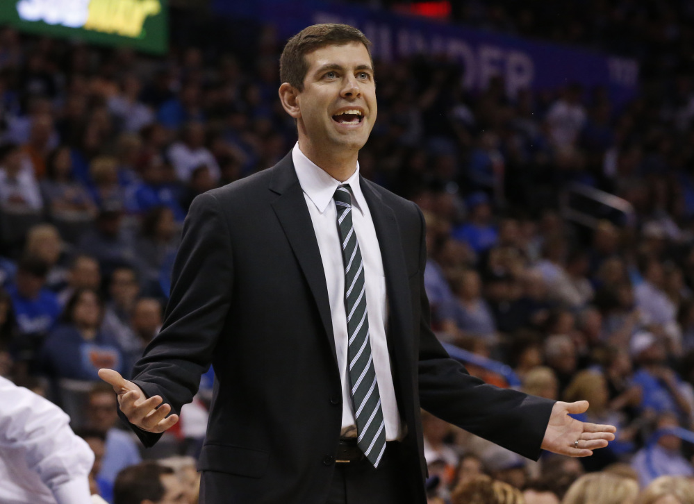 Boston Celtics head coach Brad Stevens gestures to an official in the first quarter of an NBA basketball game against the Oklahoma City Thunder in Oklahoma City, Wednesday. Oklahoma City won 122-118.