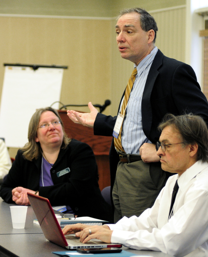 Dennis Culley, staff attorney for the Legal Services For the Elderly, speaks on Thursday during a panel discussion at the Maine Hospital Association in Augusta. Jessica Maurer, executive director of the Maine Association of Area Agencies on Aging, left, and Dr. Lewis Mehl-Madrona, director of the geriatrics fellowship at Maine Dartmouth Family Medicine Residency in Augusta, also spoke at the event.