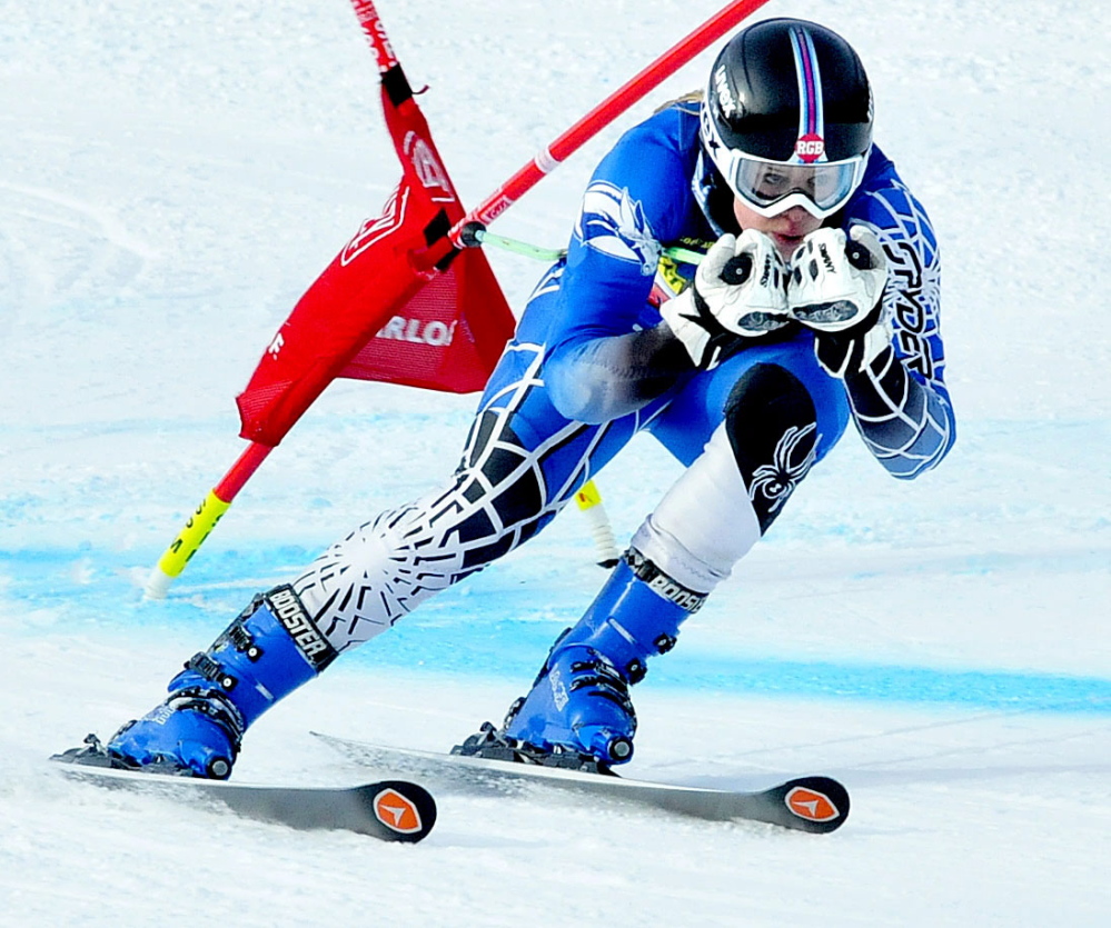 Colby College’s Mardi Haskell races to the finish line during the women’s giant slalom race Thursday the U.S. Alpine Championships at Sugarloaf Mountain.