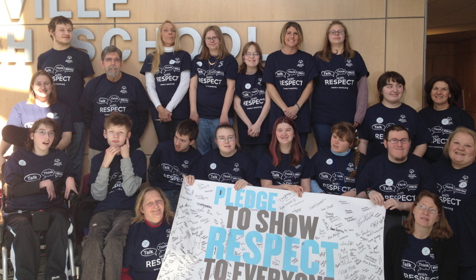 Waterville Senior High School students were asked to sign a banner to pledge to use respectful language for all. In front, from left, are Kim Clark and Karen Cookson; middle row, from left, are Lily Schwiderke, Harrison Roscoe, Finnegan Grant, Jessie Williams, Ryleigh Dube, Mackenzie Strickland, Nick Belanger and Tabatha King; and back, from left, are Christina LaChance, Sage Turmelle, Bill L’Heureux, Deborah Hatch, Theresa Lamanteer, Hannah Bryant, Sherri Lecrone, Traci Lamanteer, Lauren Anderson and Kathy Worcester. For more information, visit <a href="r-word.org">r-word.org</a>.