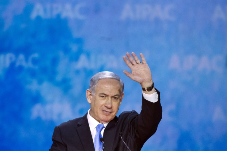 Israeli Prime Minister Benjamin Netanyahu waves at the conclusion of his address to the 2015 American Israel Public Affairs Committee (AIPAC) Policy Conference in Washington, Monday.
