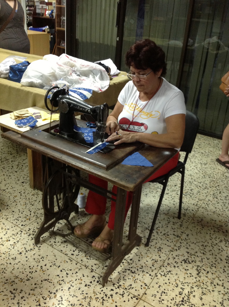In Havana, a woman makes yarmulkes for sale at Adath Israel, the only Orthodox Jewish synagogue remaining in Cuba.