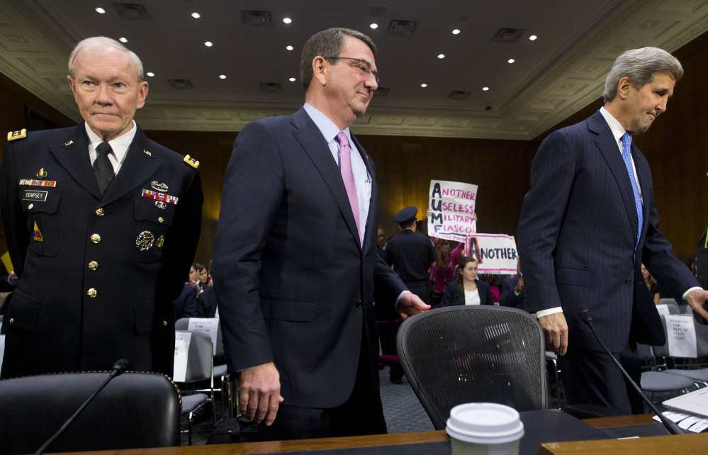 From left, Joint Chief Chairman Gen. Martin Dempsey, Defense Secretary Ash Carter, and Secretary of State John Kerry on Capitol Hill in Washington on Wednesday. The three testified on Islamic State militants before the Senate Foreign Relation Committee.