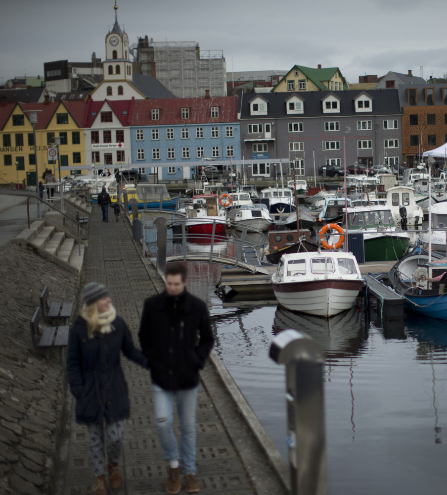 Boats lie in the harbor in Torshavn, the capital city of the Faeroe Islands. The Faeroe Islands, a semi-autonomous Danish archipelago, and Svalbard, a Norwegian archipelago in the Arctic Ocean, are the only two places in the world where a total solar eclipse can be viewed Friday.
The Associated Press