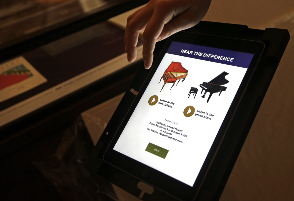 An interactive audio tablet is set up at the exhibit, which is aimed at making classical and Baroque music cool for the iTunes generation and beyond.