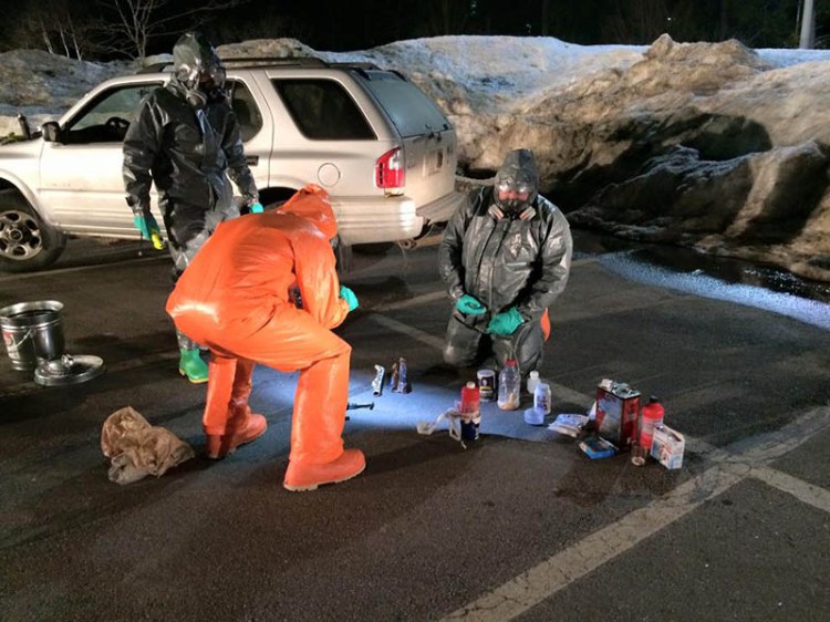 Maine Drug Enforcement Agency agents dismantle a one pot meth lab discovered in a Brunswick man's vehicle.