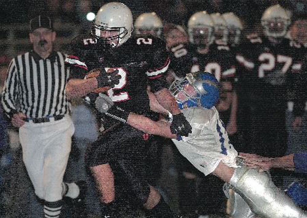 Former Somerset Area High School football star Aaron Chambers, seen in action against Lawrence High School in 2005, said he remembers Rob Washburn not only as a football coach, but as a man who “taught us a lot about life and how to be the best that we could be.” Chambers, 26, is now a staff sergeant in the U.S. Air Force.