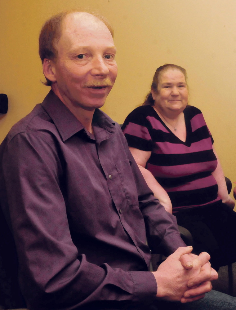 After Michael Fernald received free hearing aids on Thursday, he and his wife, Diane, of Clinton, were happy. Fernald lost his hearing after he was injured in a car accident two years ago.