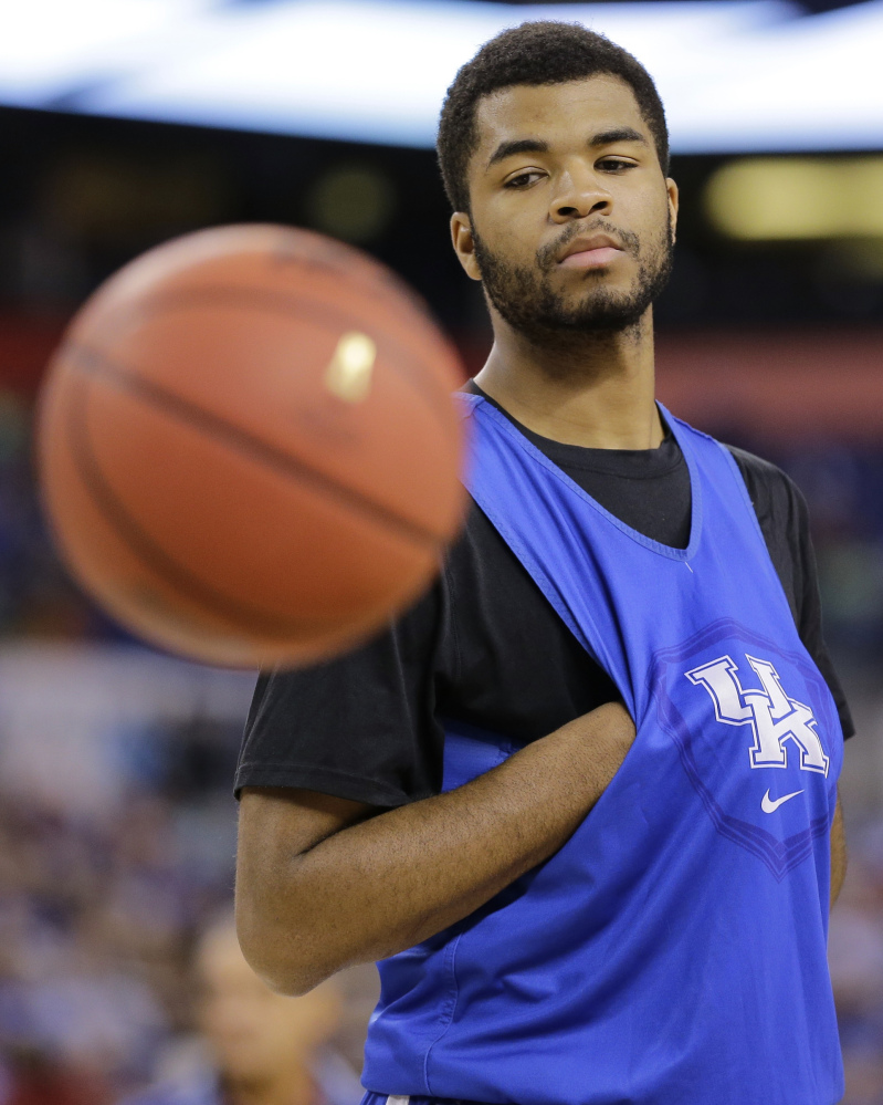 In this April 3, 2015 file photo, Kentucky’s Andrew Harrison watches a ball during a practice session for the NCAA Final Four tournament college basketball semifinal game, in Indianapolis.
