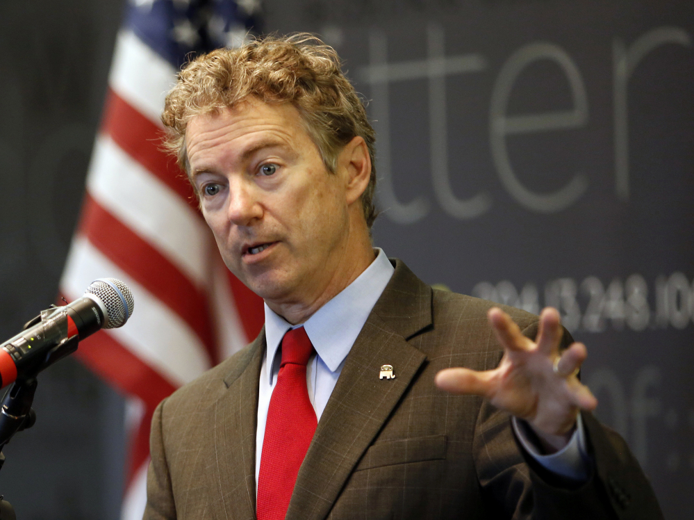 In this March 20, 2015, file photo, Sen., Rand Paul, R-Ky. speaks in Manchester, N.H. Ready to enter the Republican chase for the party’s presidential nomination this week, the first-term Kentucky senator has designs on changing how Republicans go about getting elected to the White House and how they govern once there.