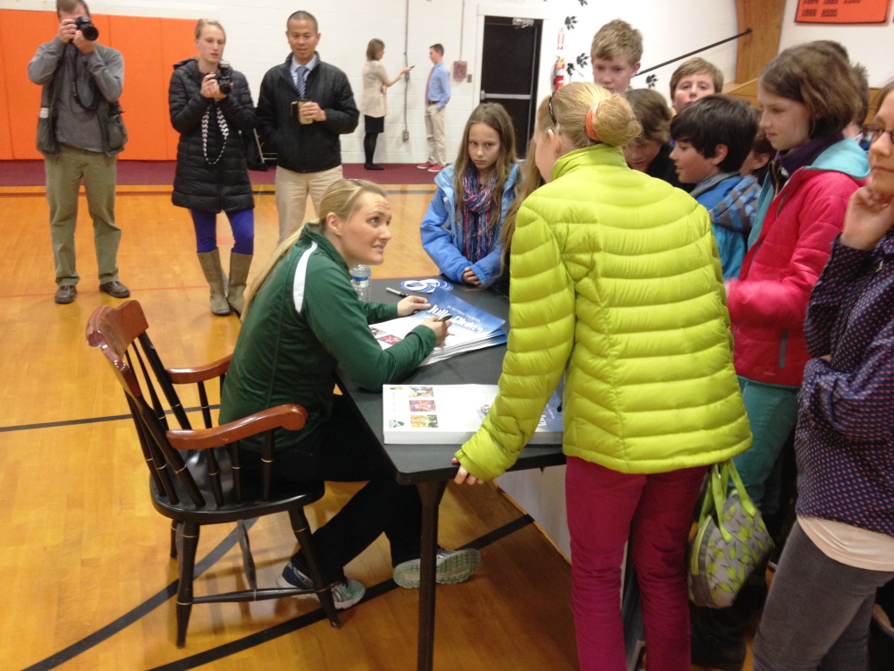 Julia Clukey, of Augusta, talks to students at North Yarmouth Academy on Tuesday morning.