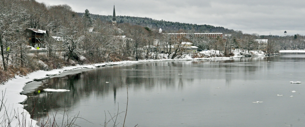 Ice floats downstream on Thursday on the Kennebec River in Hallowell.