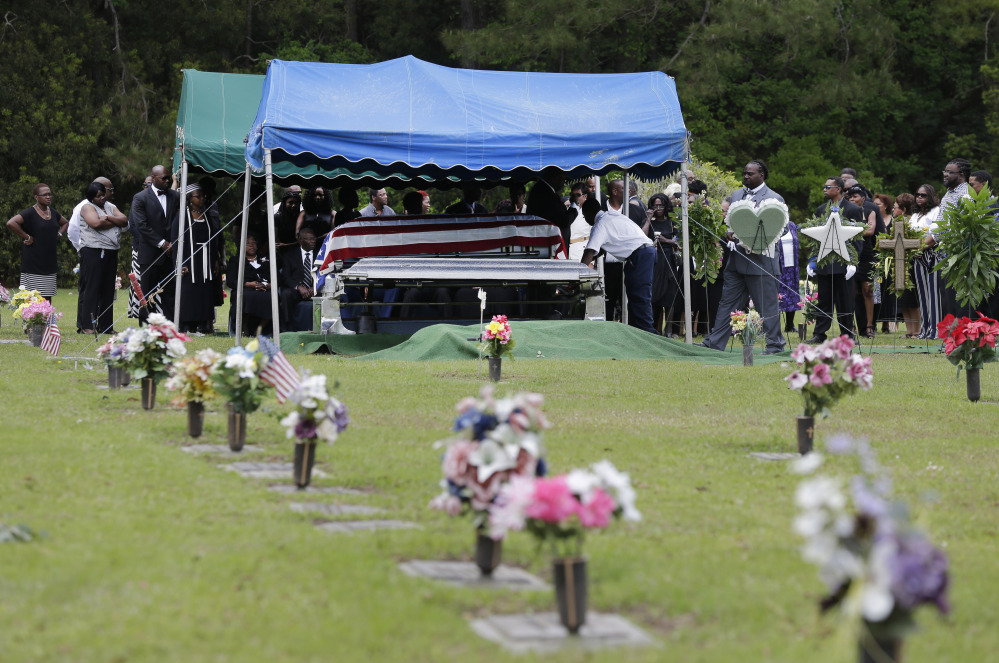 Family and friends attend the burial service for Walter Scott in Charleston, S.C. on Saturday.