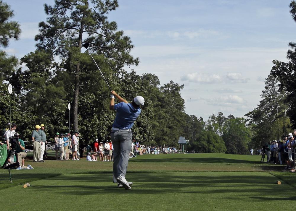 Jordan Spieth tees off on the ninth tee during the third round of the Masters golf tournament Saturday in Augusta, Ga.