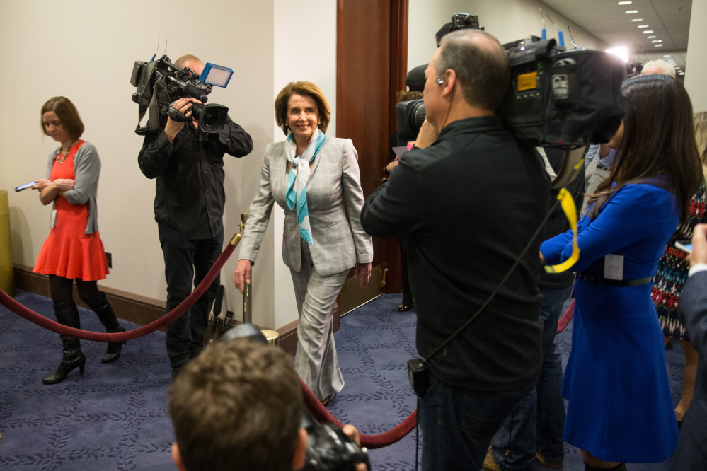 House Minority Leader Nancy Pelosi of Calif. arrives on Capitol Hill in Washington, Tuesday for  a House Democratic Caucus meeting  to discuss the Iran nuclear deal with Secretary of State John Kerry.