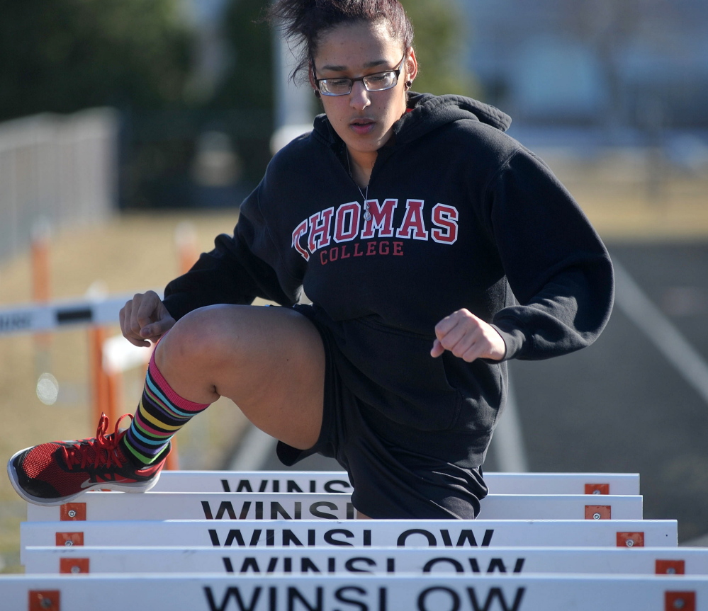 Thomas College sophomore, Sarah Fleming works out during track club practice Wednesday at Winslow High School.
