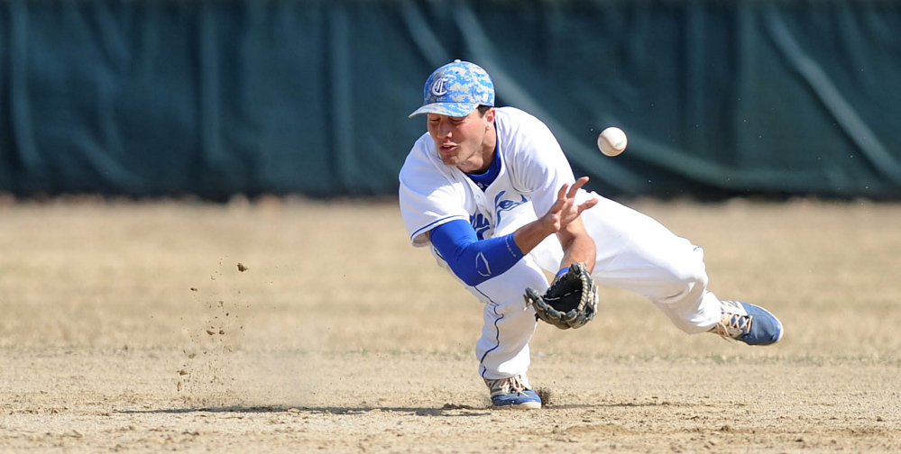 Colby College shortstop Tommy Forese (14) misses the ground ball in the first inning against Tufts University on Friday at Colby College in Waterville.