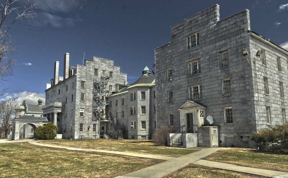 The Stone complex at the former Augusta Mental Health Institute in Augusta would be renovated for use as state office space under a proposal in the state budget.