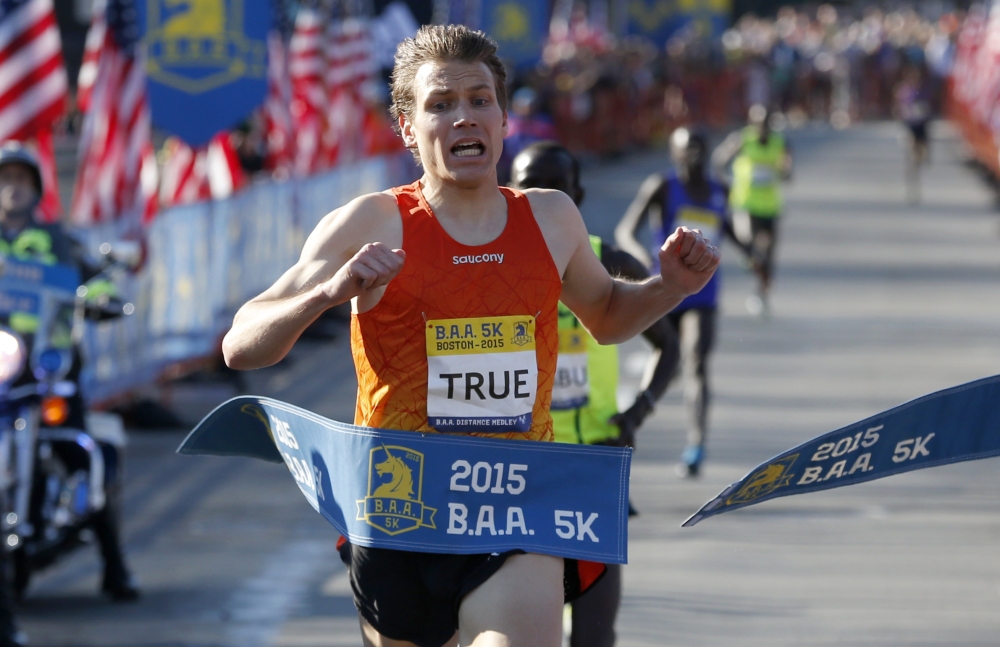 Ben True wins the men’s division in the Boston Marathon 5k in Boston on Saturday.