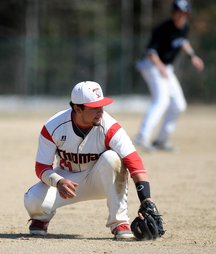 Thomas College third baseman Michael De Los Santos fields a ground ball in the fifth inning Saturday against Colby-Sawyer at Thomas College in Waterville.