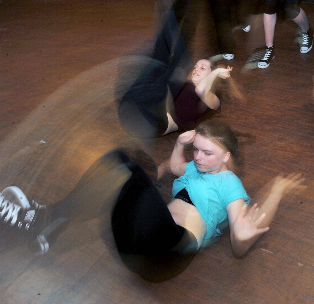 Josie Libby, 14, rehearses a routine with her dance group at Bradley’s School of Dance in Skowhegan on Friday.