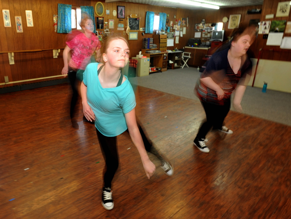 Josie Libby, 14, rehearses a routine with her dance group at Bradley’s School of Dance in Skowhegan on Friday.