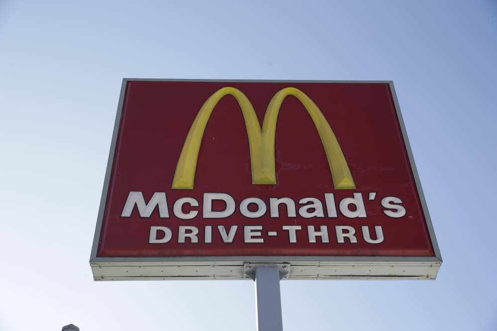This Thursday, Jan. 15, 2015, file photo, shows a McDonald’s fast food restaurant sign in Chicago.