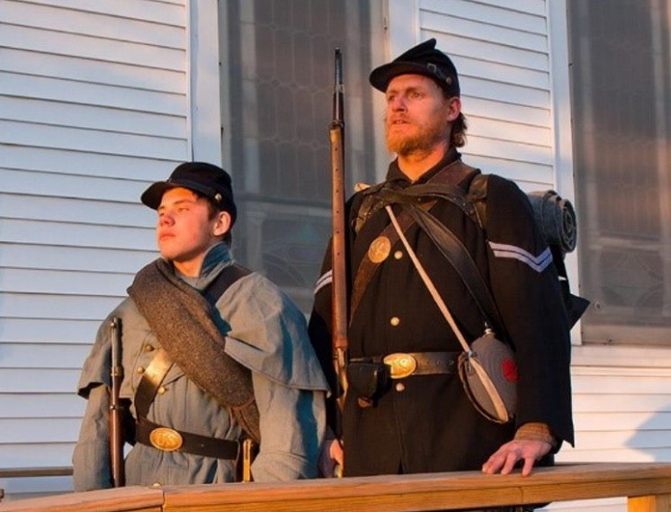 Two re-enactors from the 20th Maine Co., from left, are B. Brendon Howe and Carman Kirkpatrick.