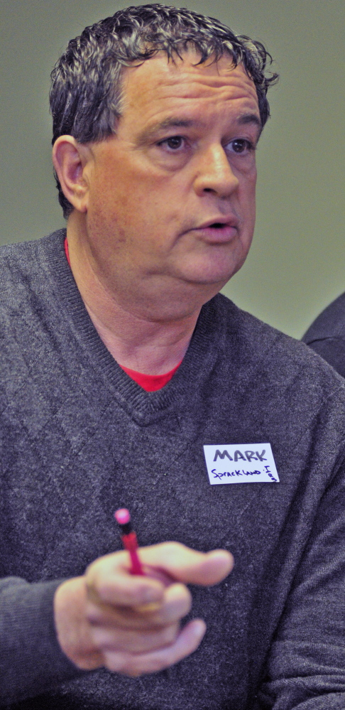 Mark Sprakland, executive director of the Independent Retailers Coop, speaks during a conference on business cooperatives Saturday at the Viles Arboretum in Augusta.