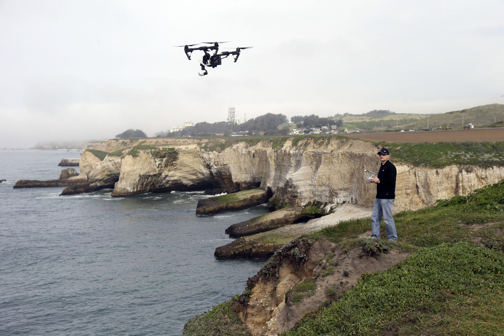 Romeo Durscher, director of education for drone-maker DJI, flies one of his company’s products March 10, 2015, in Davenport , Calif.