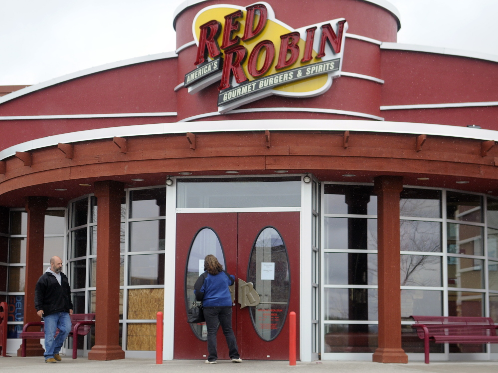 Diners are turned away Monday from the Red Robin in Augusta after a fire damaged the kitchen Sunday night.