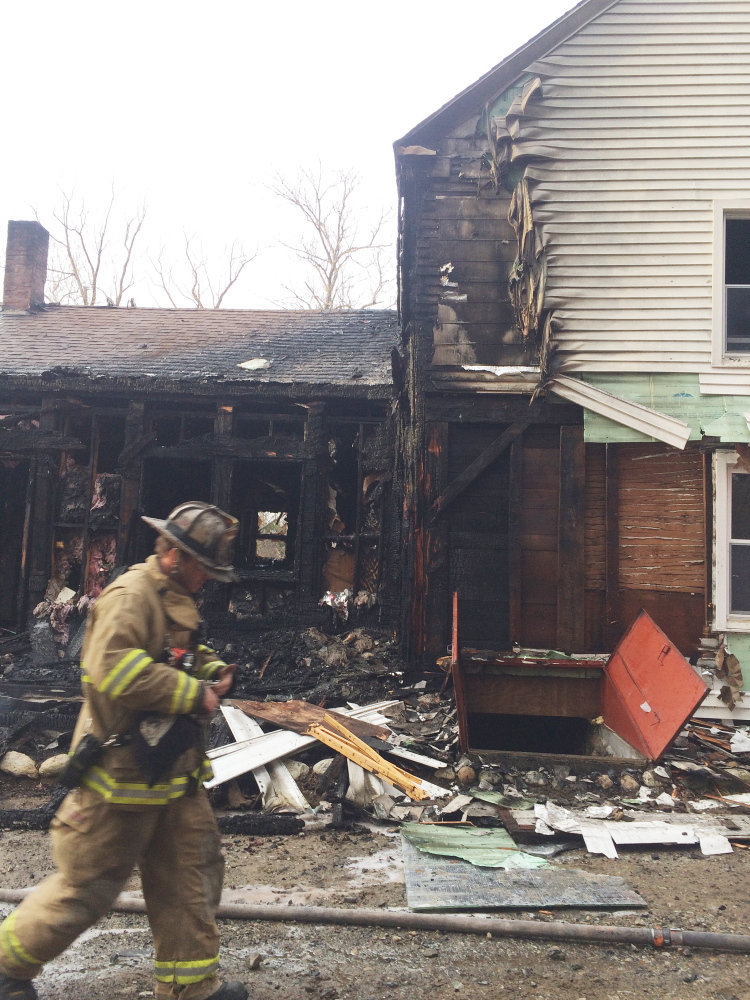A mother and her two young children safely escaped a fire Sunday that destroyed a portion of an Old Cedar Grove Road home in Pittston.