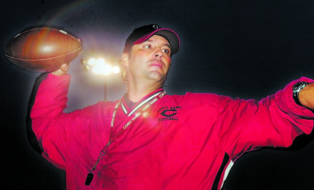 Former Cony High School football coach Robby Vachon runs a drill during practice in 2007, his first season at the helm. Now, eight years later, Vachon is out after announcing his resignation. His departure caught fellow Pine Tree Conference Class B coaches by surprise.