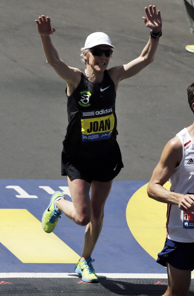 Former Boston Marathon and Olympic gold medal winner Joan Benoit Samuelson crosses the finish line of the 118th Boston Marathon in 2014. Benoit Samuelson, the first gold medalist in the women’s Olympic marathon and a trailblazer in women’s running, will be the commencement speaker next week at the University of Maine at Farmington.