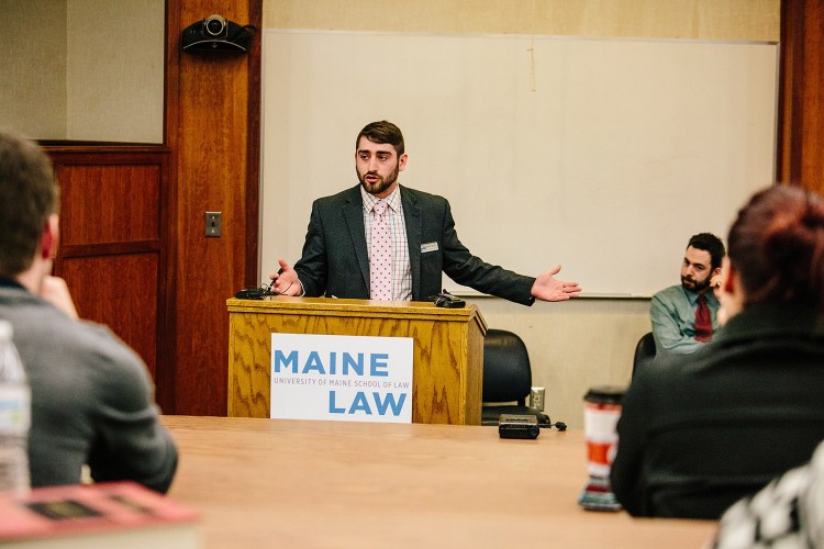 David Boyer from Campaign to Regulate Marijuana Like Alcohol speaks during the Maine Law Federalist Society debate on marijuana reform in the Middle Room of the University of Maine School of Law in Portland.