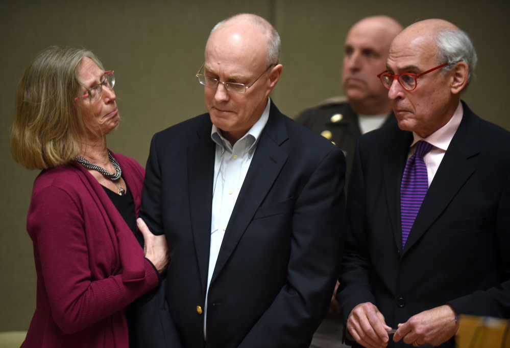 Robert Dellinger is flanked by his attorneys while his sentence of nine to 20 years is read by the judge in Grafton Superior Court in North Haverhill, N.H., Thursday.