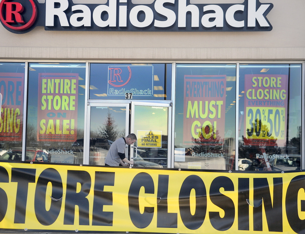 Charles Weymouth unlocks the RadioShack store at the MarketPlace in Augusta in February. A new ownership group is trying to breathe new life into the electronics chain.
2011 Kennebec Journal file photo/Andy Molloy

