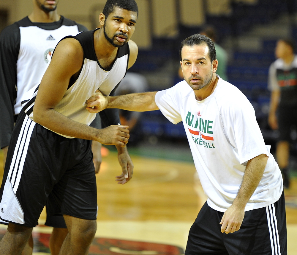 PORTLAND, ME - NOVEMBER 6: Red Claws Head Coach Scott Morrison works with the players like Ralph Sampson III during practice drills on Media Day. (Photo by Gordon Chibroski/Staff Photographer)