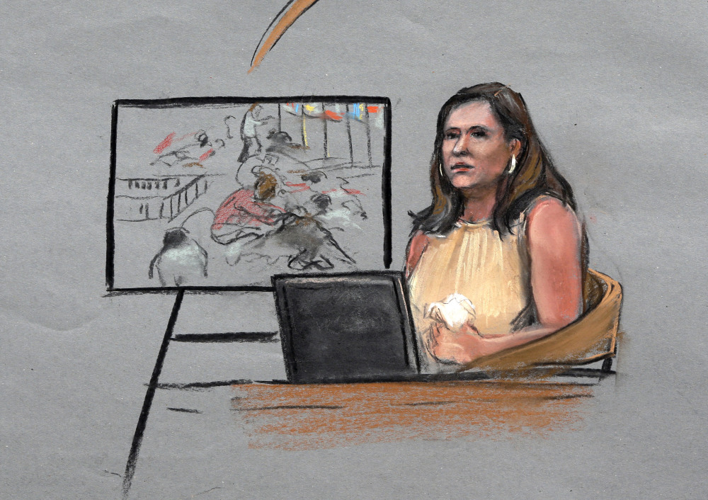 In this courtroom sketch, Boston Marathon bombing survivor Celeste Corcoran is depicted on the witness stand during the first day of the penalty phase in the trial of Boston Marathon bomber Dzhokhar Tsarnaev, Tuesday in federal court in Boston. Corcoran lost both legs below the knee in the first explosion near the marathon finish line in 2013.