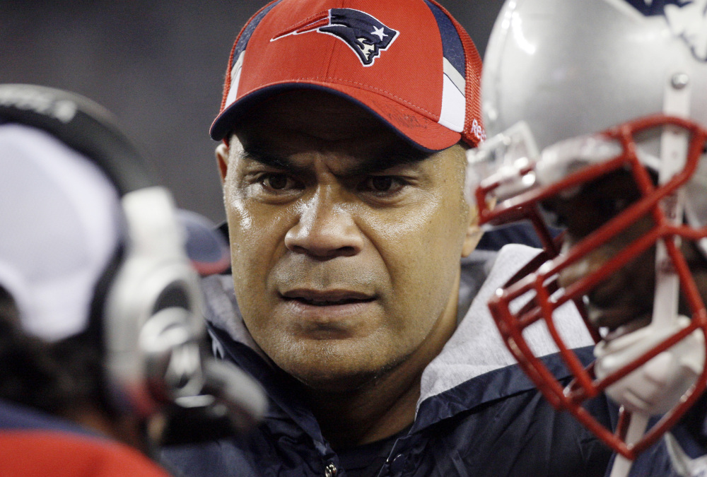 The family of former New England Patriots linebacker Junior Seau, center, is one of about 200 NFL retirees or their families who have rejected the settlement and plan to sue the league individually over concussion injuries. Seau killed himself in 2012 after his behavior became increasingly erratic.