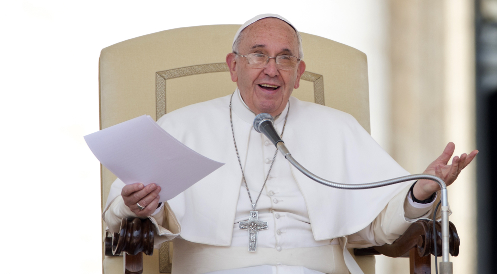 Pope Francis delivers his message during the weekly general audience in St. Peter’s Square at the Vatican, Wednesday.